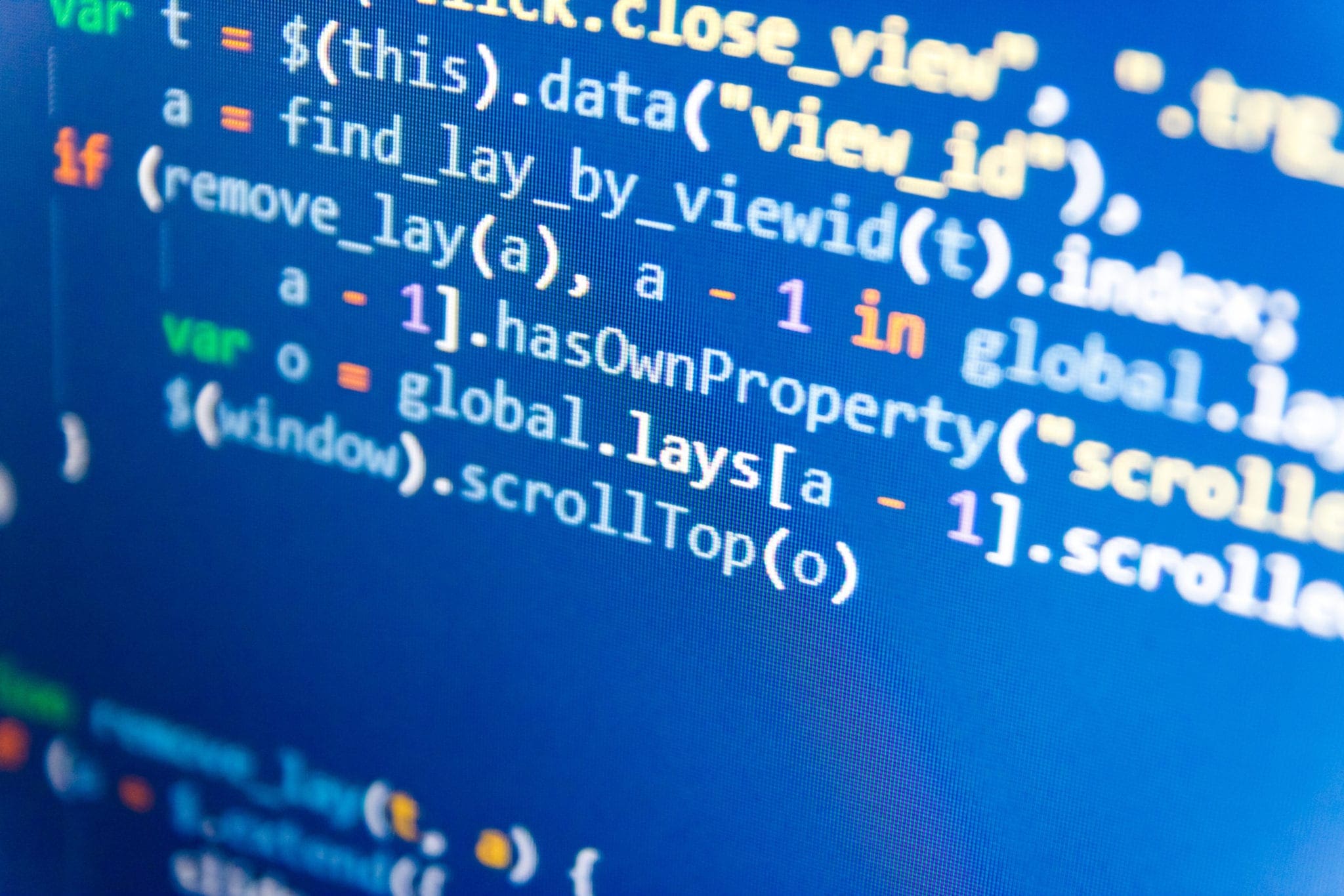 Close-up of programming code on a computer screen highlighting JavaScript code