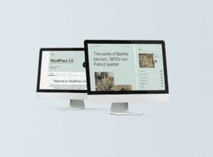 two computers displaying a wordPress website