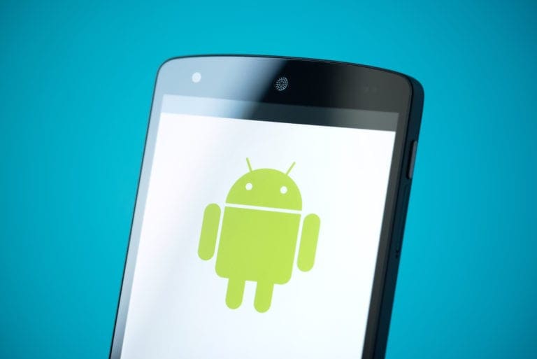 Android phone displaying the green Android robot logo on a white screen