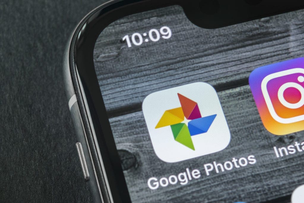 Google Photos and Instagram app icons on a smartphone screen