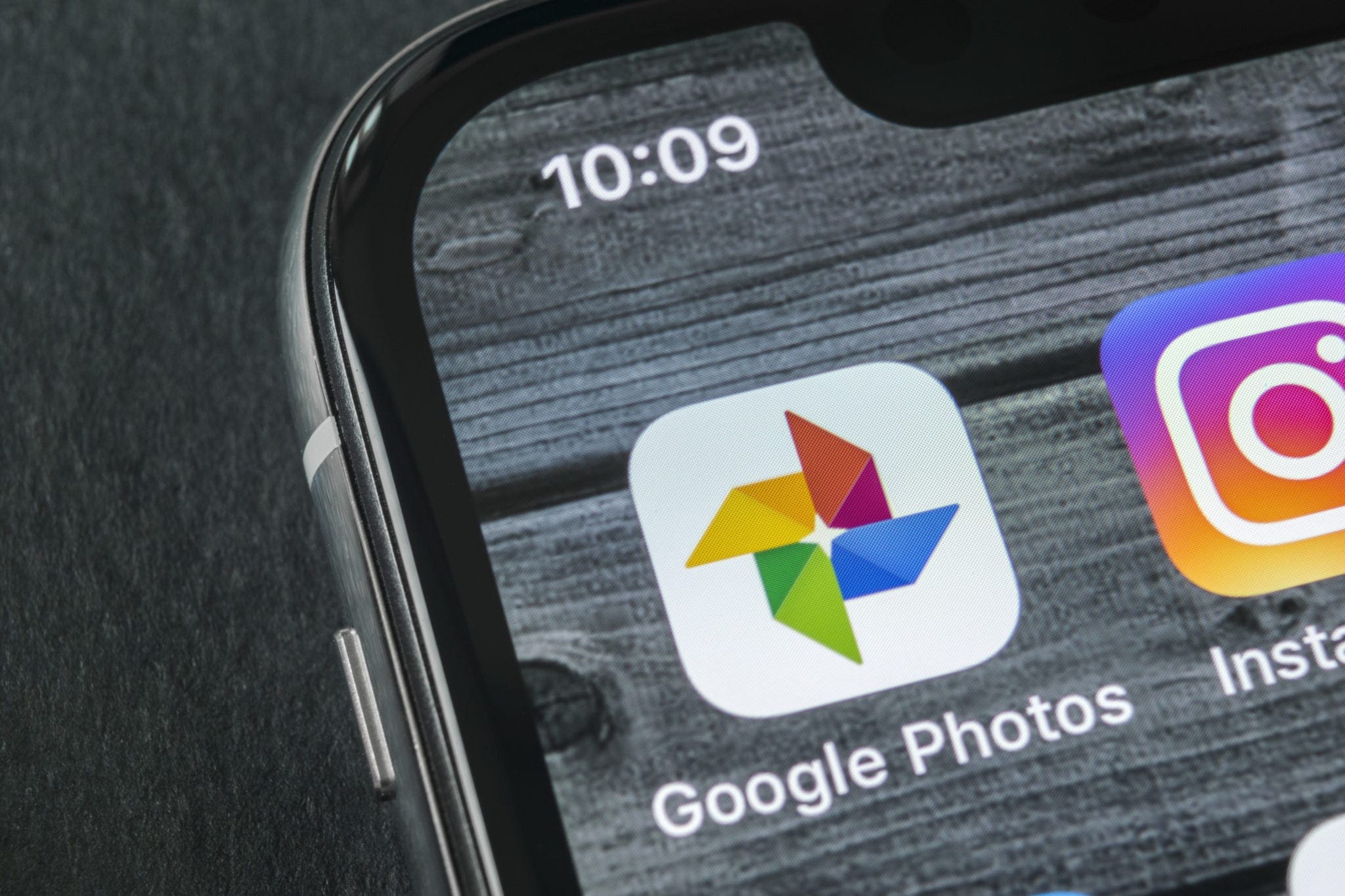 Google Photos and Instagram app icons on a smartphone screen
