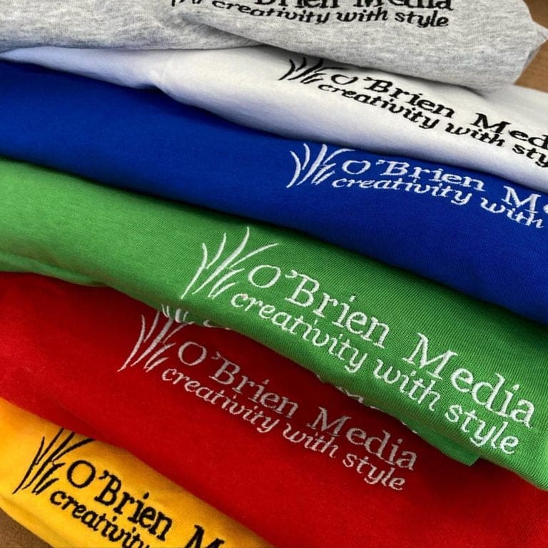 O'Brien Media t-shirts in multiple colours with embroidered logos