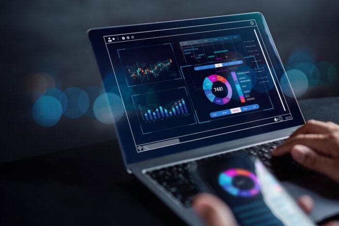 Close-up of a laptop screen displaying website analytics and update statistics, symbolising GDPR compliance and software updates
