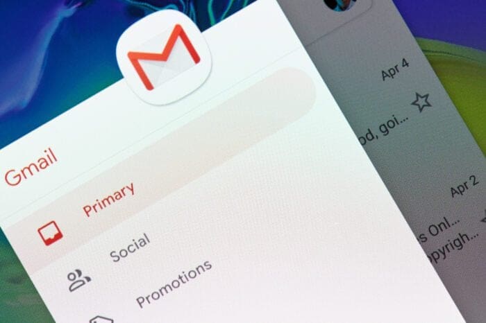 Close-up view of Gmail interface highlighting the Primary, Social, and Promotions tabs