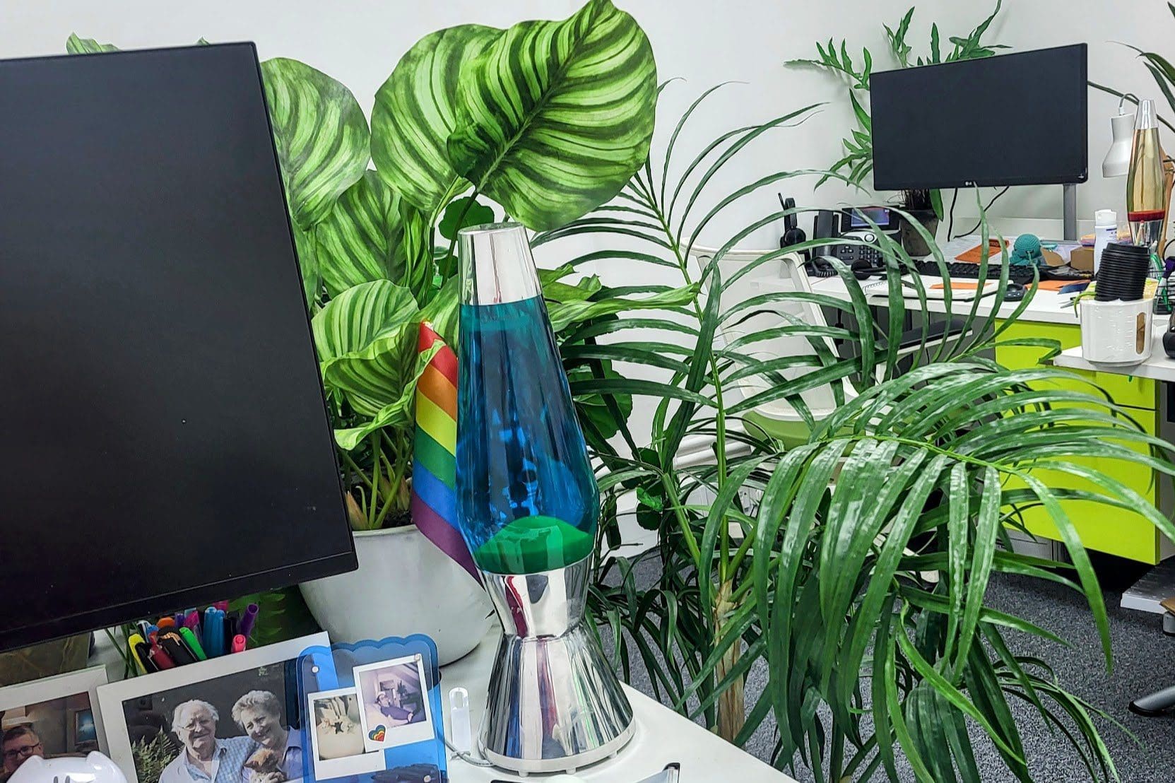 O'Brien Media team in a modern office setting, showcasing collaboration and the company’s commitment to quality web design and client support.