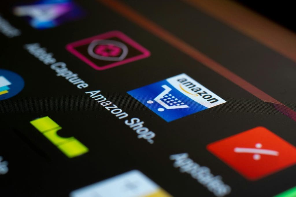 Amazon Shopping app icon shown on a smartphone screen